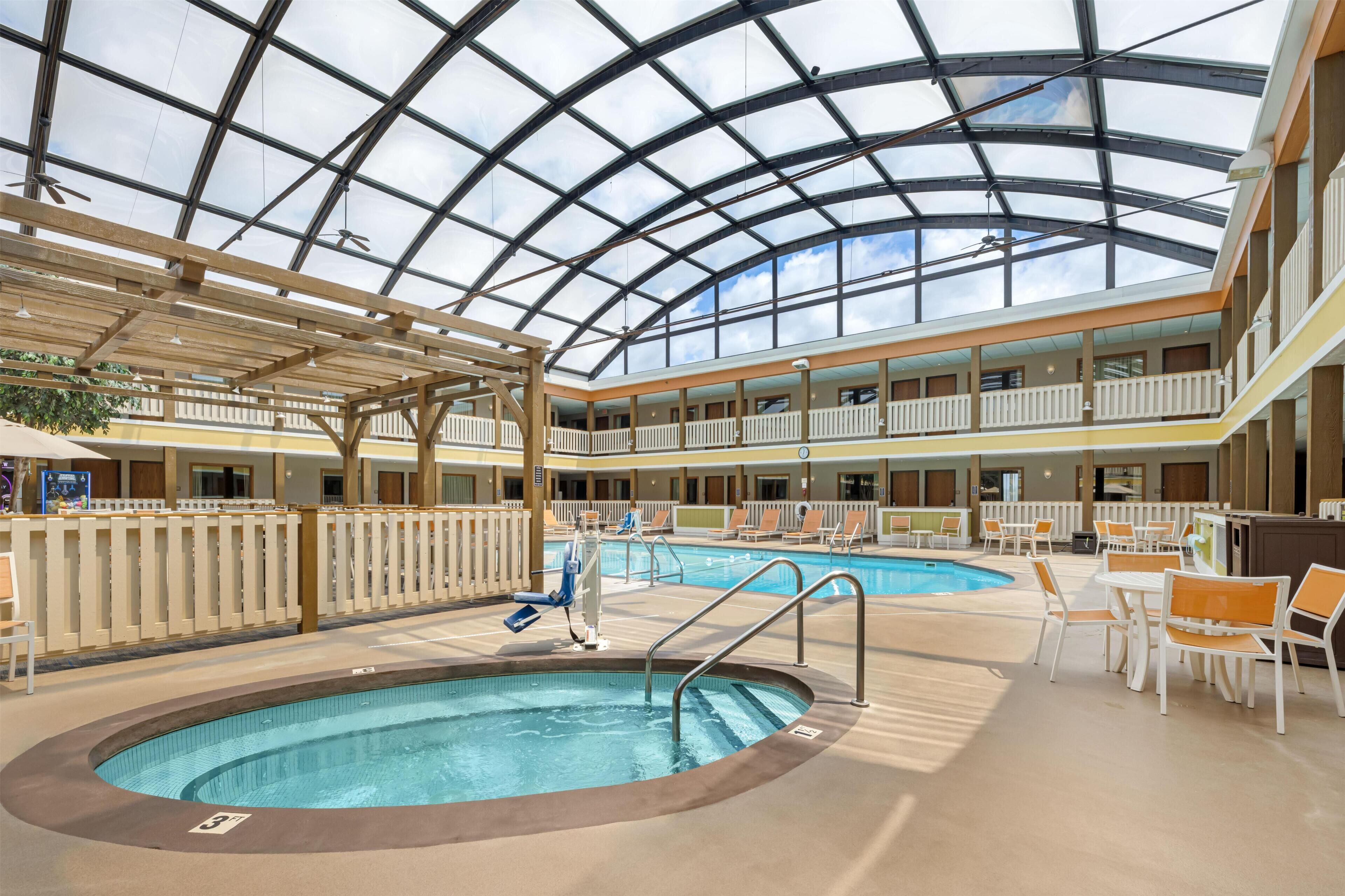 Indoor pool, open 9:00 AM to 10:00 PM, pool umbrellas, sun loungers