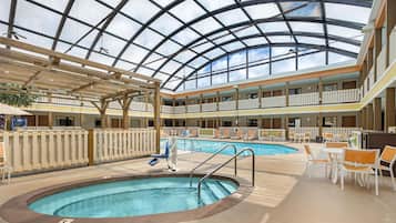 Indoor pool, open 9:00 AM to 10:00 PM, pool umbrellas, sun loungers