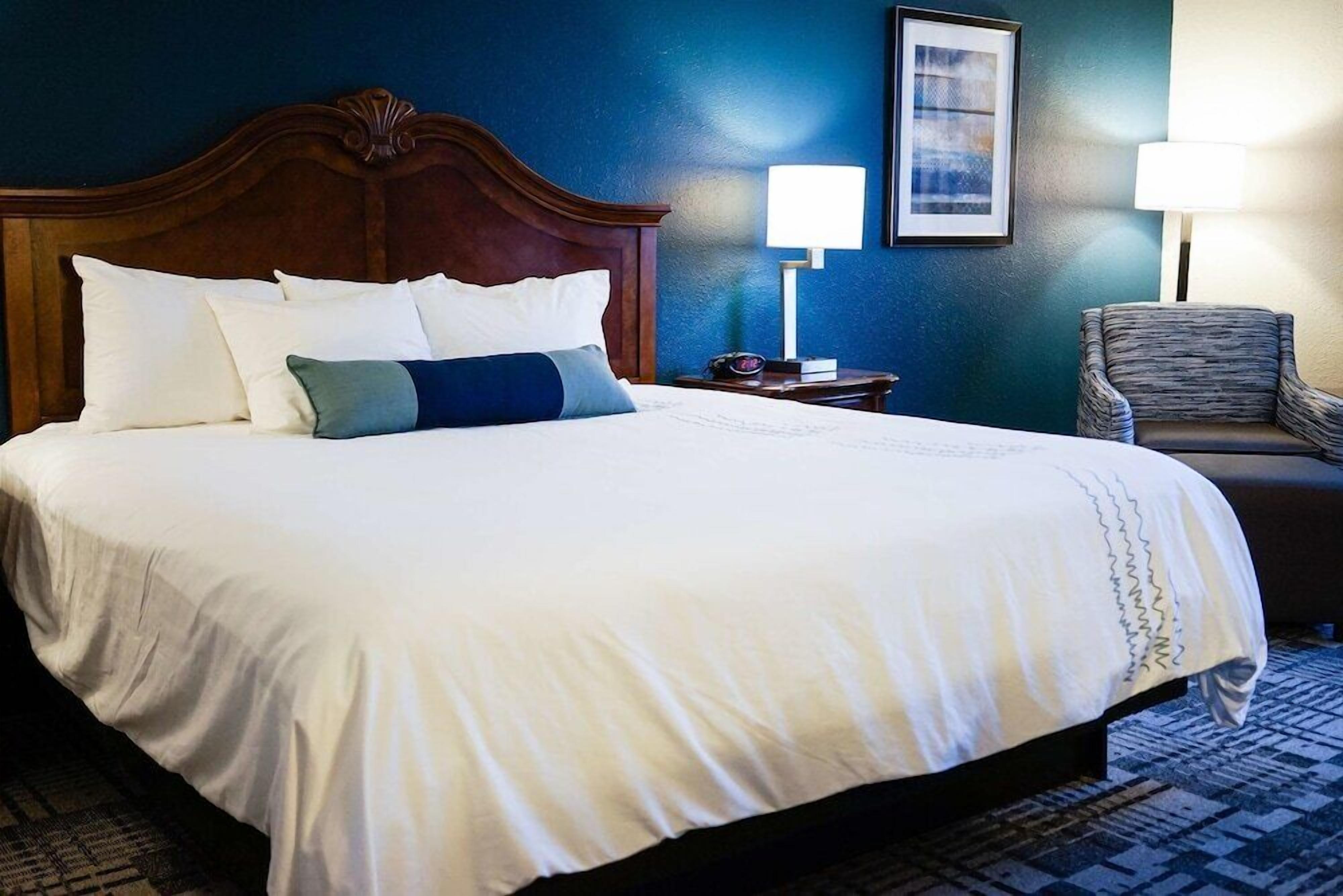 Premium bedding, pillowtop beds, desk, laptop workspace