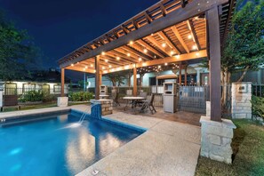 Seasonal outdoor pool, open 8:30 AM to 10:00 PM, pool umbrellas