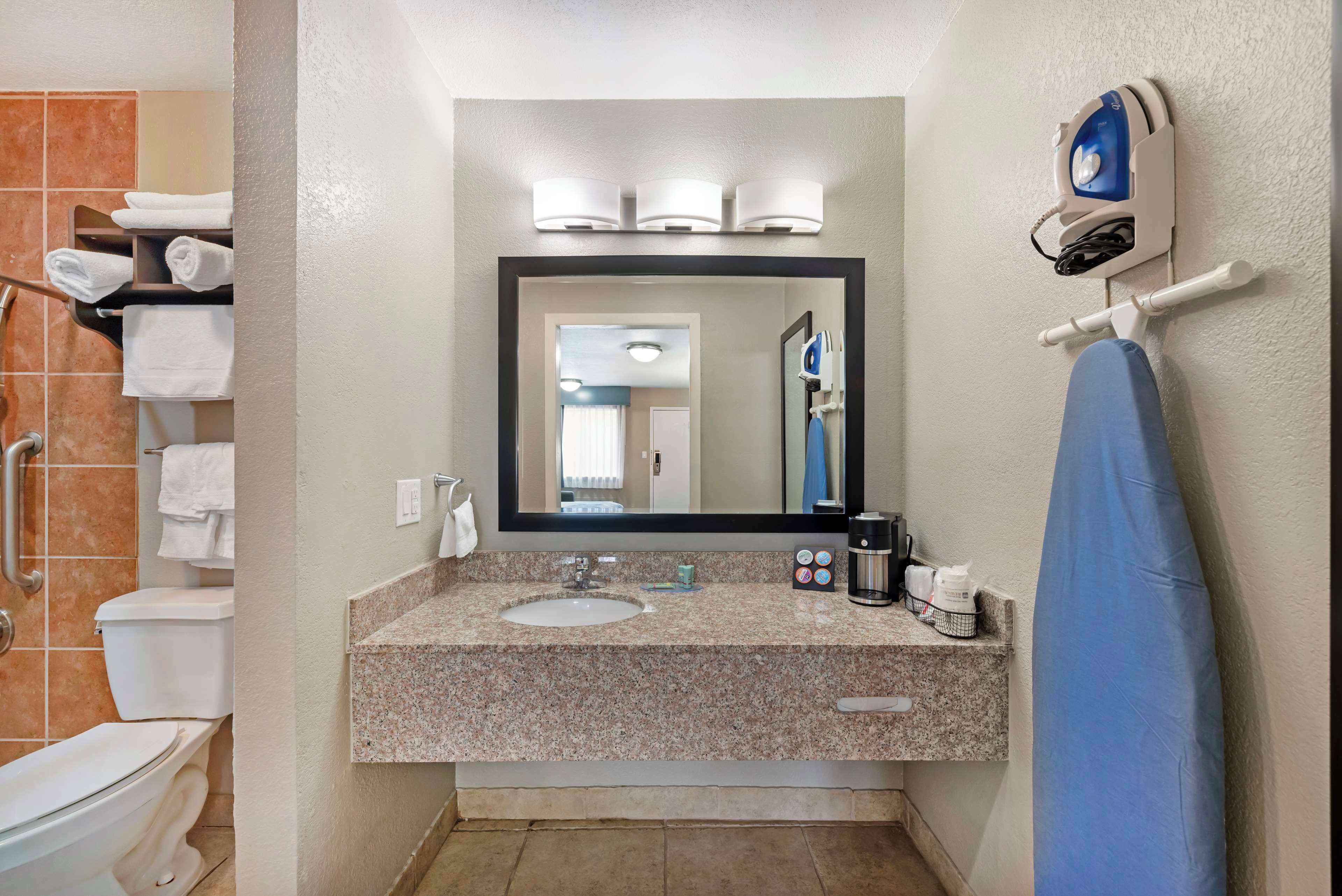 standard room, 1 king bed, accessible, refrigerator & microwave (with sofabed) | bathroom | combined shower/bathtub, free toiletries, hair dryer, towels