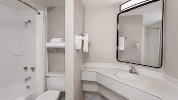 Room, 1 King Bed, Non Smoking | Bathroom | Combined shower/tub, free toiletries, hair dryer, towels