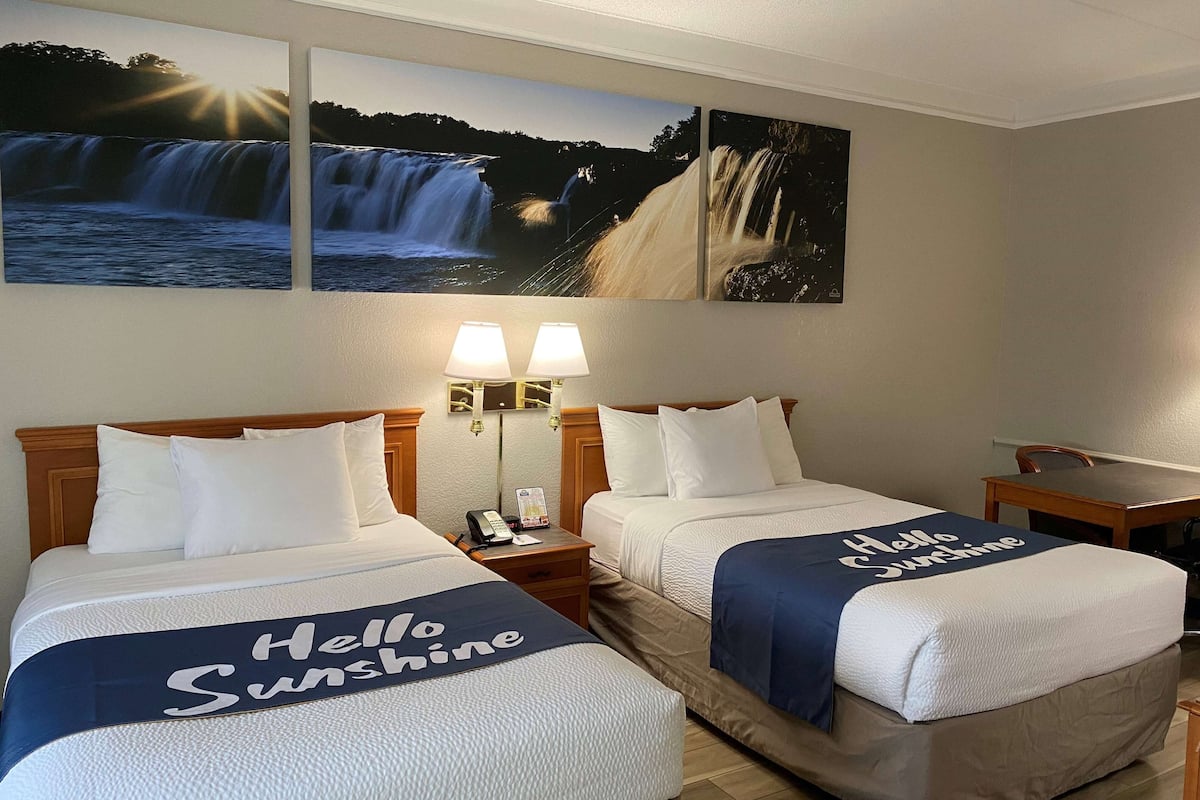 Premium bedding, desk, iron/ironing board, free cribs/infant beds