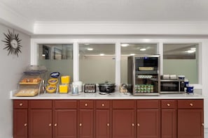 Free daily on-the-go breakfast  - Days Inn & Suites by Wyndham Arlington Heights (Arlington Heights)