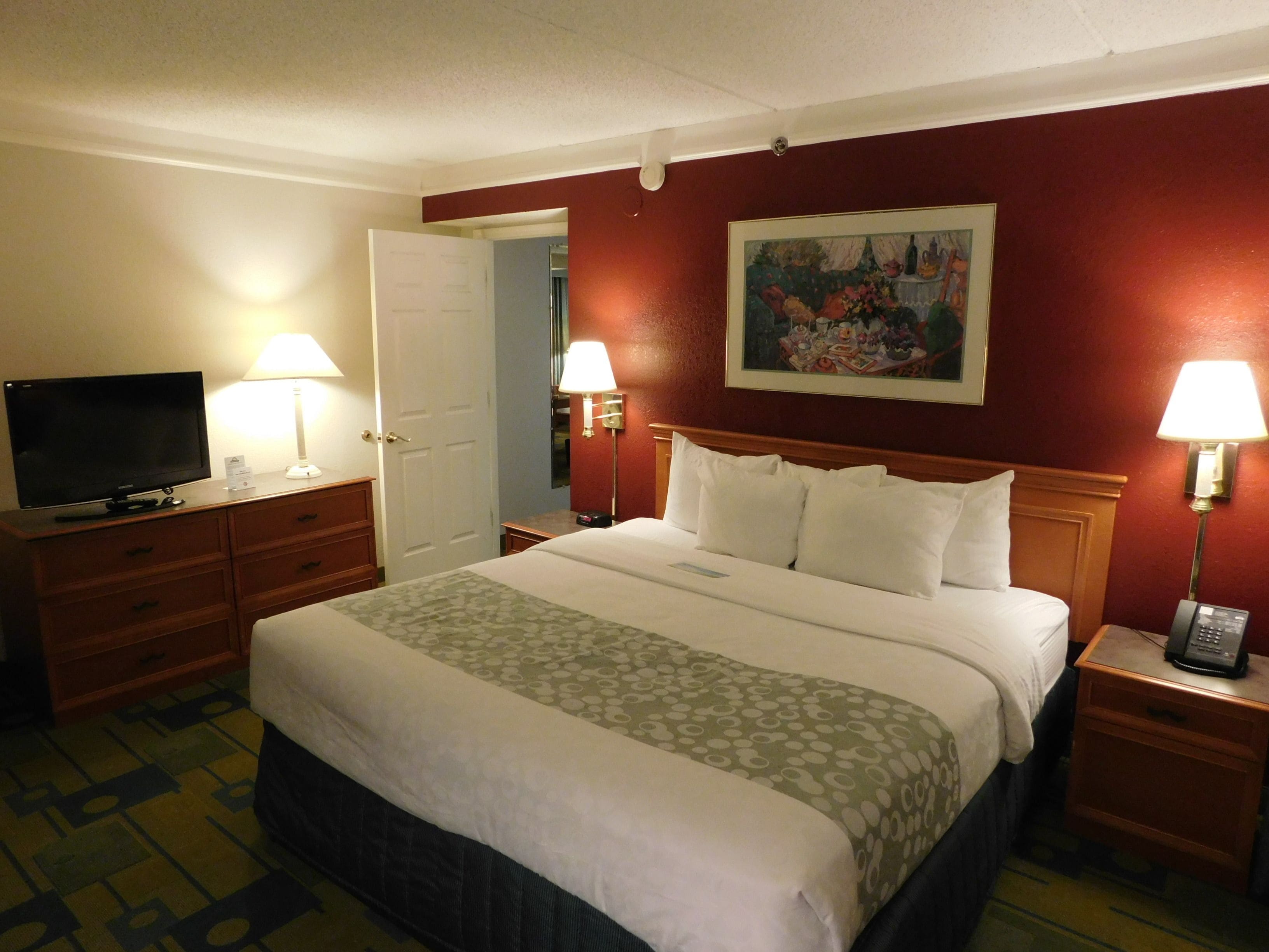 suite, 1 king bed, non smoking | premium bedding, desk, iron/ironing board, free cots/infant beds