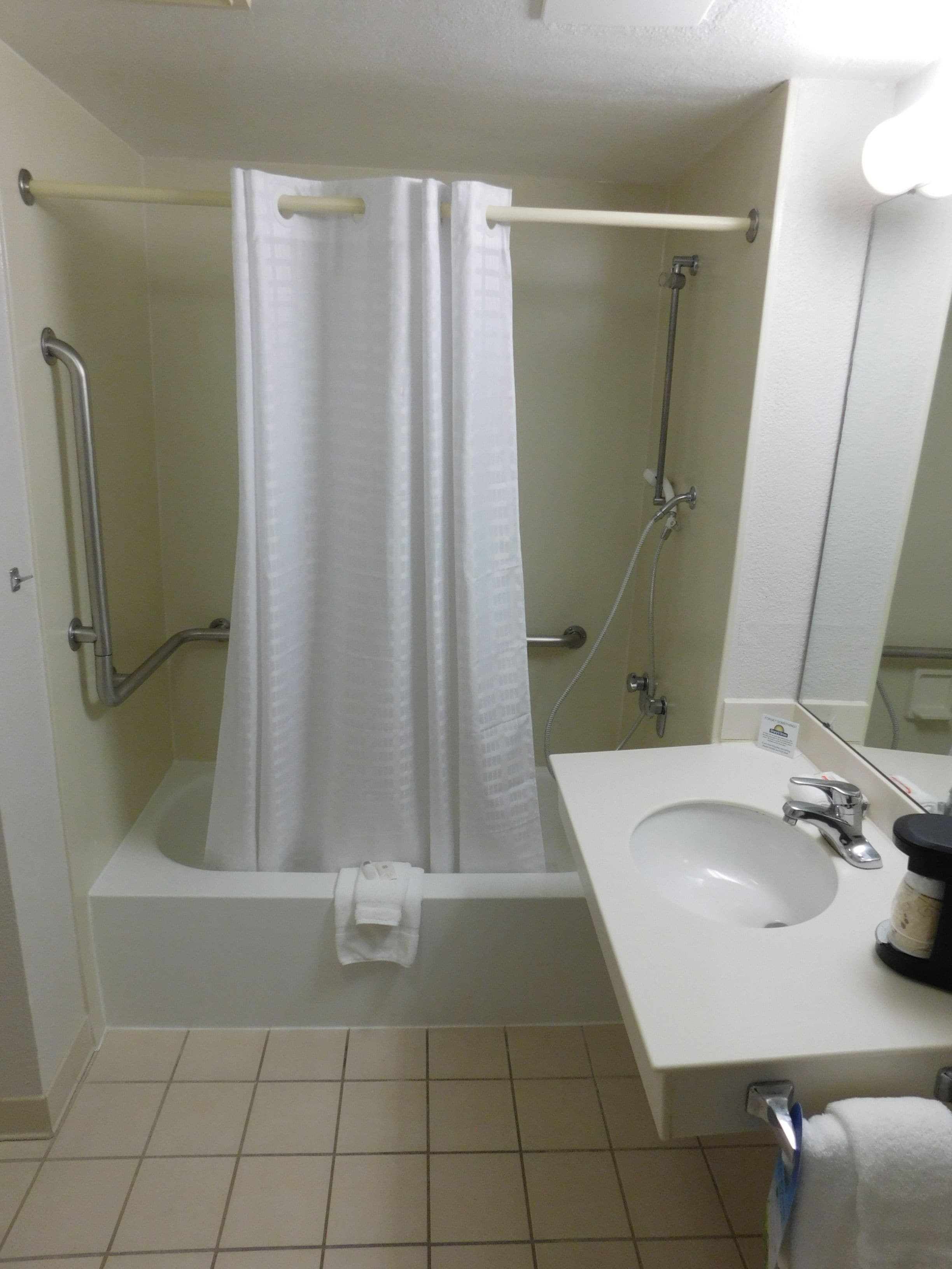 combined shower/bathtub, free toiletries, hair dryer, towels