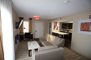 Studio Suite, 1 King Bed, Non Smoking | Desk, laptop workspace, blackout drapes, iron/ironing board