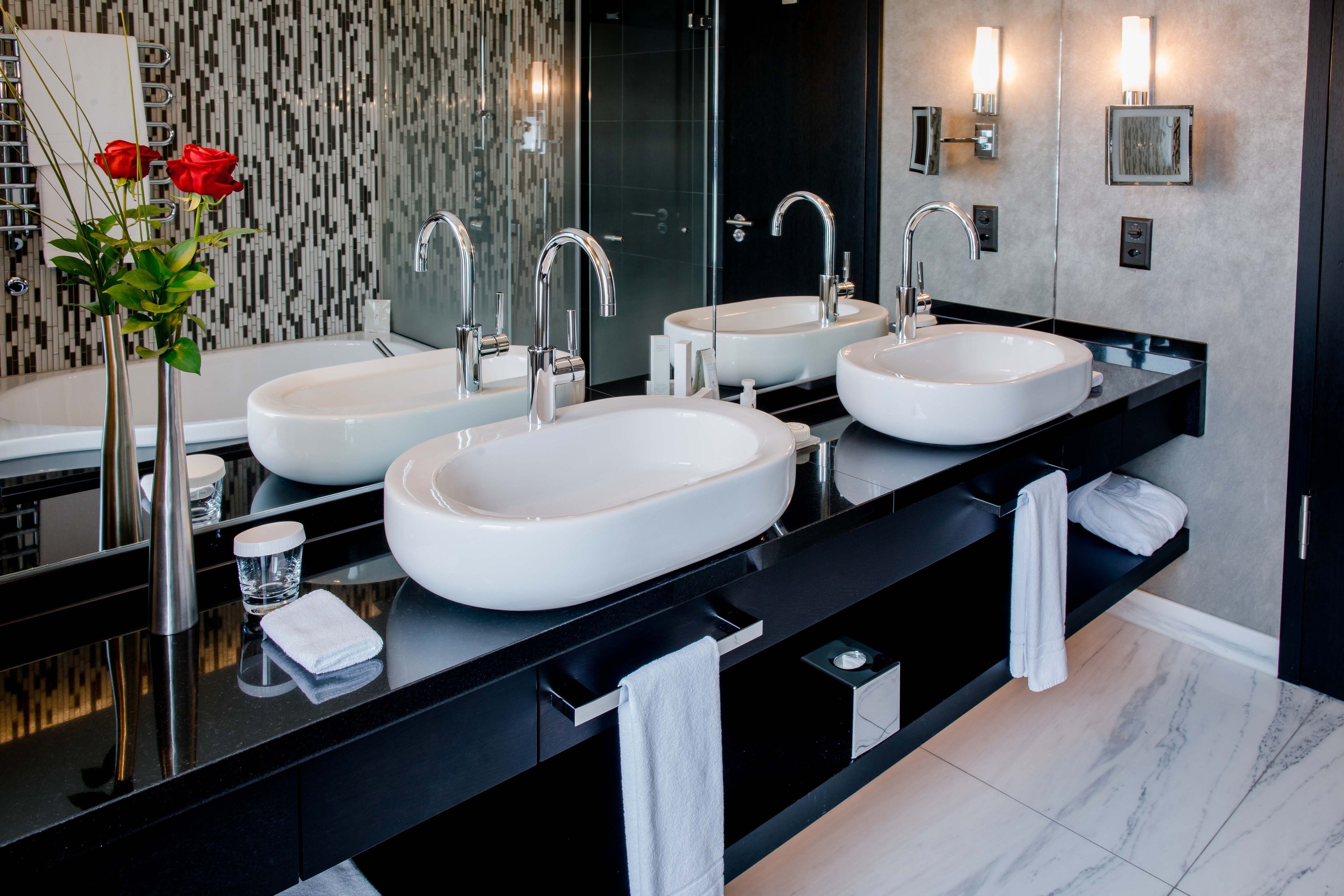 rainfall showerhead, designer toiletries, hair dryer, bathrobes