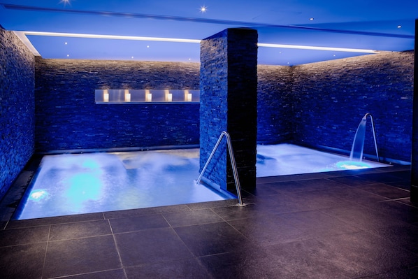 Sauna, spa tub, steam room, body treatments, hot stone massages