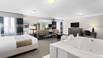 Chambre Standard, 1 très grand lit, non-fumeurs, baignoire à jets | Surmatelas, coffres-forts dans les chambres, bureau