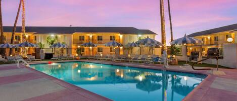 Outdoor pool, open 6:00 AM to 10:00 PM, free cabanas, pool umbrellas