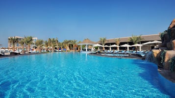 2 outdoor pools, pool umbrellas, pool loungers