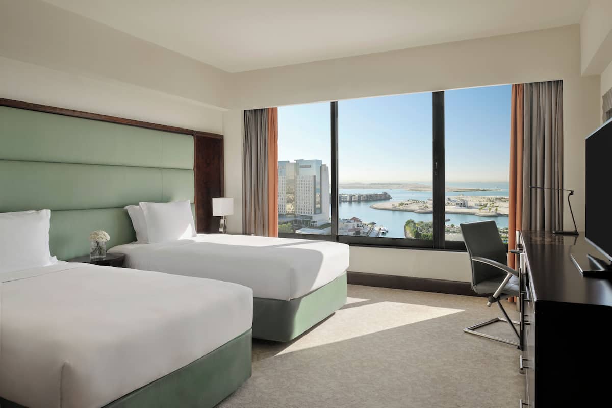 Premium bedding, down comforters, pillowtop beds, minibar