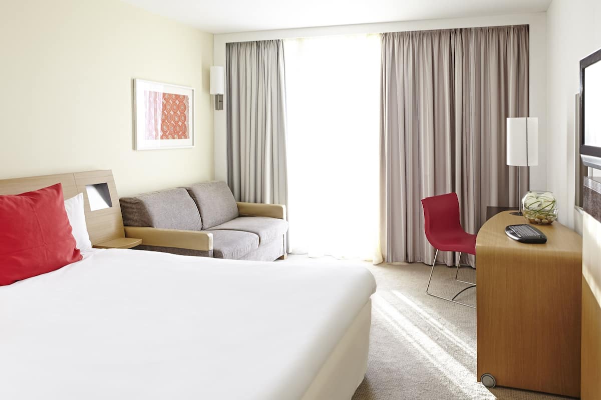 classic room, 1 double bed with sofa bed | free minibar, in-room safe, desk, blackout curtains