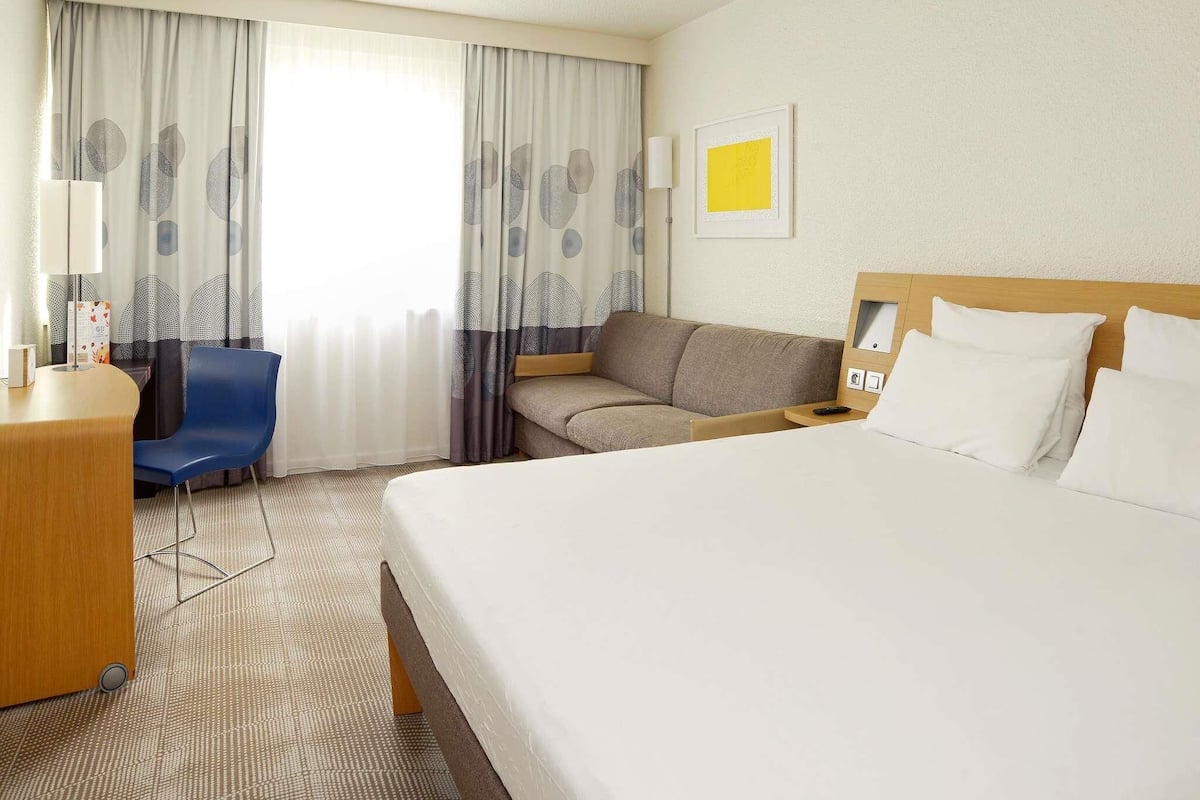 Classic Room, Multiple Beds | Free minibar, in-room safe, desk, blackout drapes