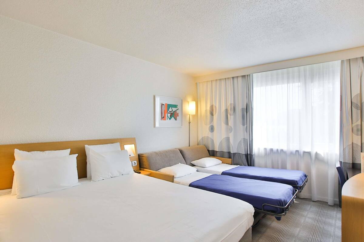 classic room, multiple beds | free minibar, in-room safe, desk, blackout curtains