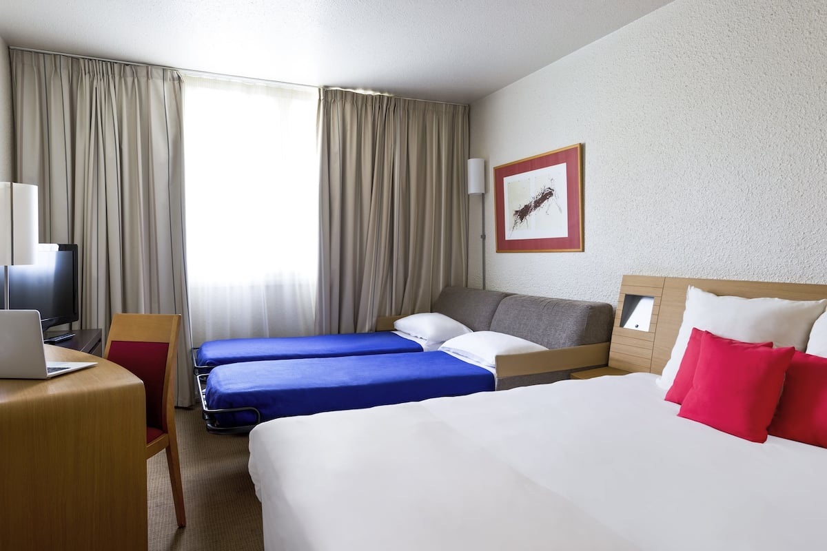 classic room, multiple beds | free minibar, in-room safe, desk, blackout curtains