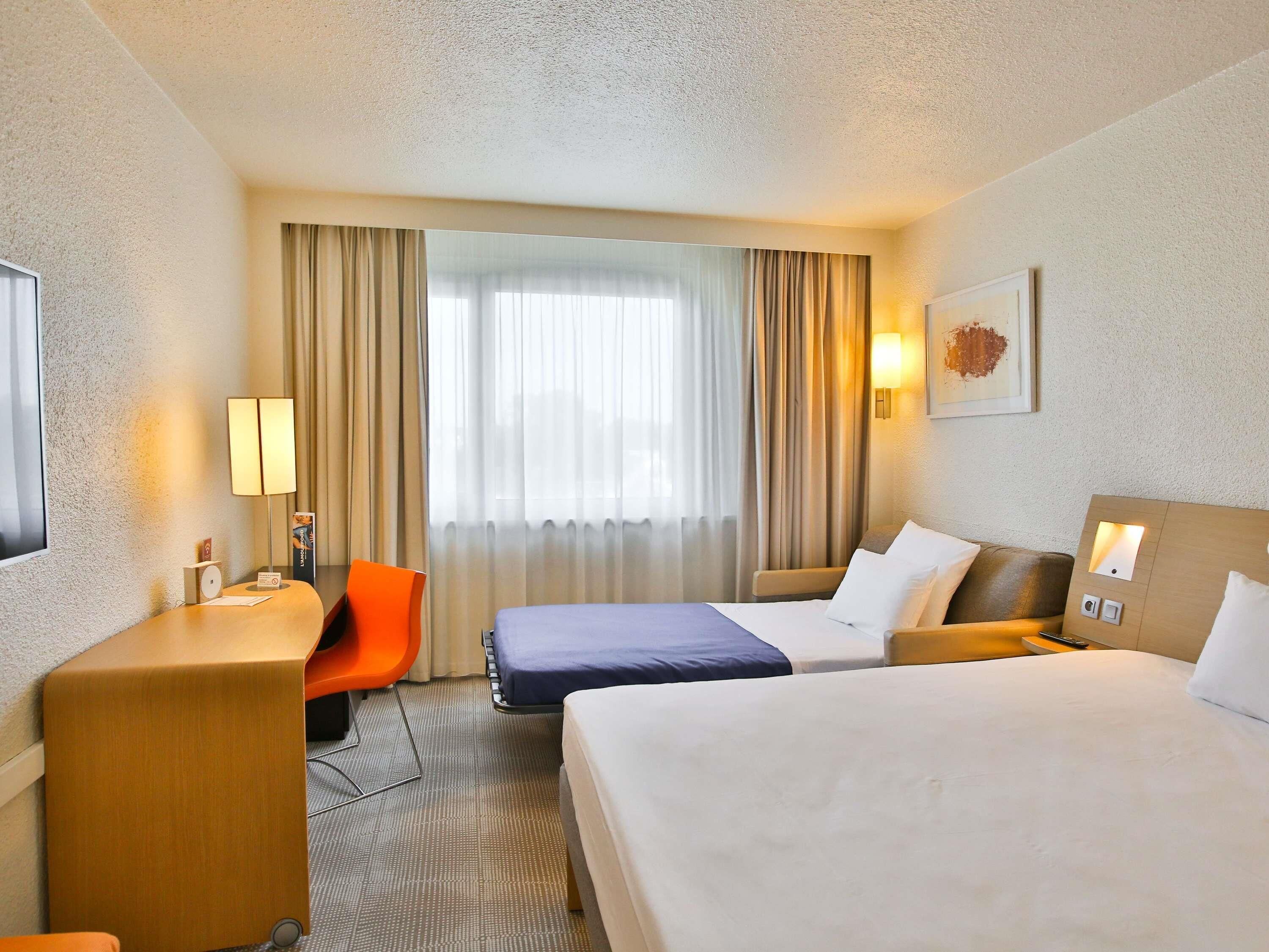 Klassieke kamer, 1 tweepersoonsbed met slaapbank | Een gratis minibar, een kluis op de kamer, een bureau