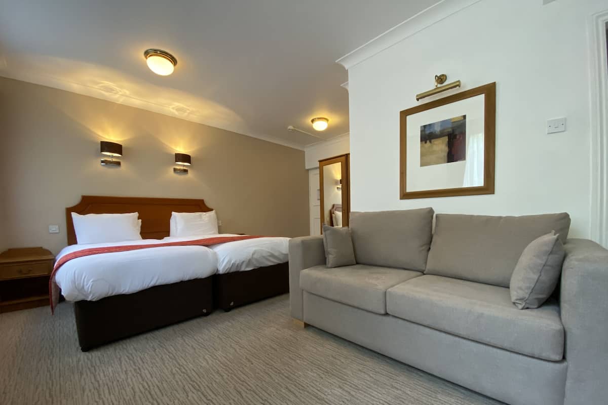 Family Room | Individually decorated, individually furnished, desk, free WiFi