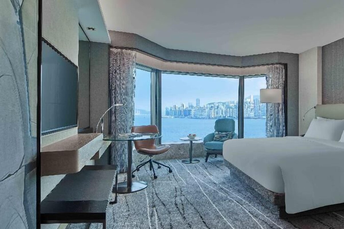 Luxe beddengoed, een minibar, een kluis op de kamer, een bureau