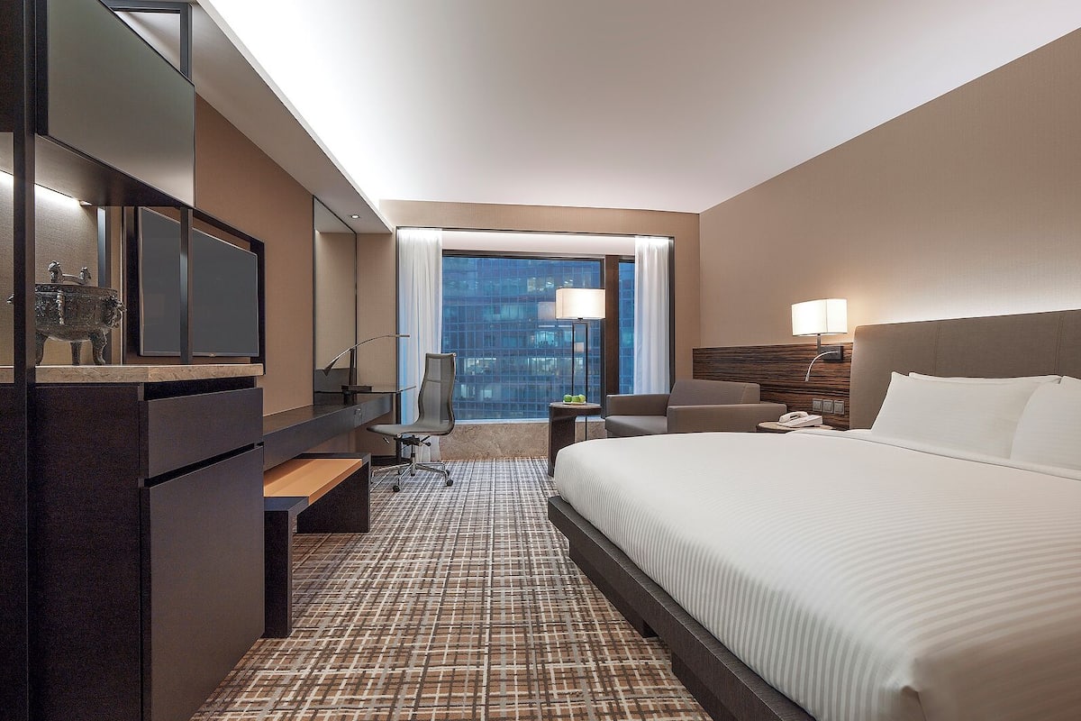 Kamar Deluks | 1 kamar tidur, seprai premium, minibar, dan brankas