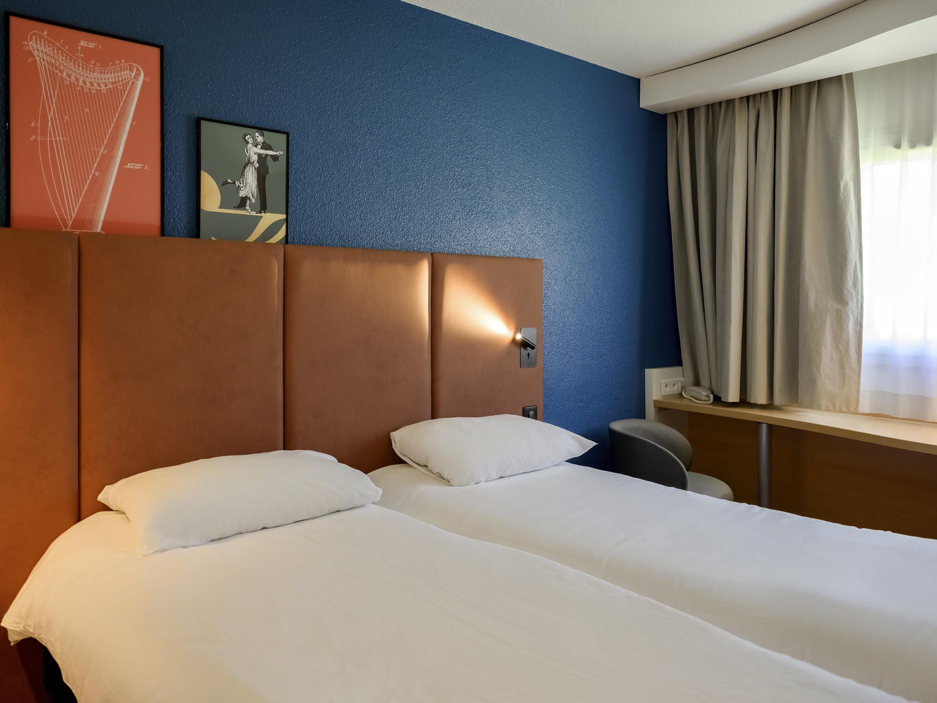 Standard Room, 2 Twin Beds | Desk, iron/ironing board, free cribs/infant beds, free rollaway beds