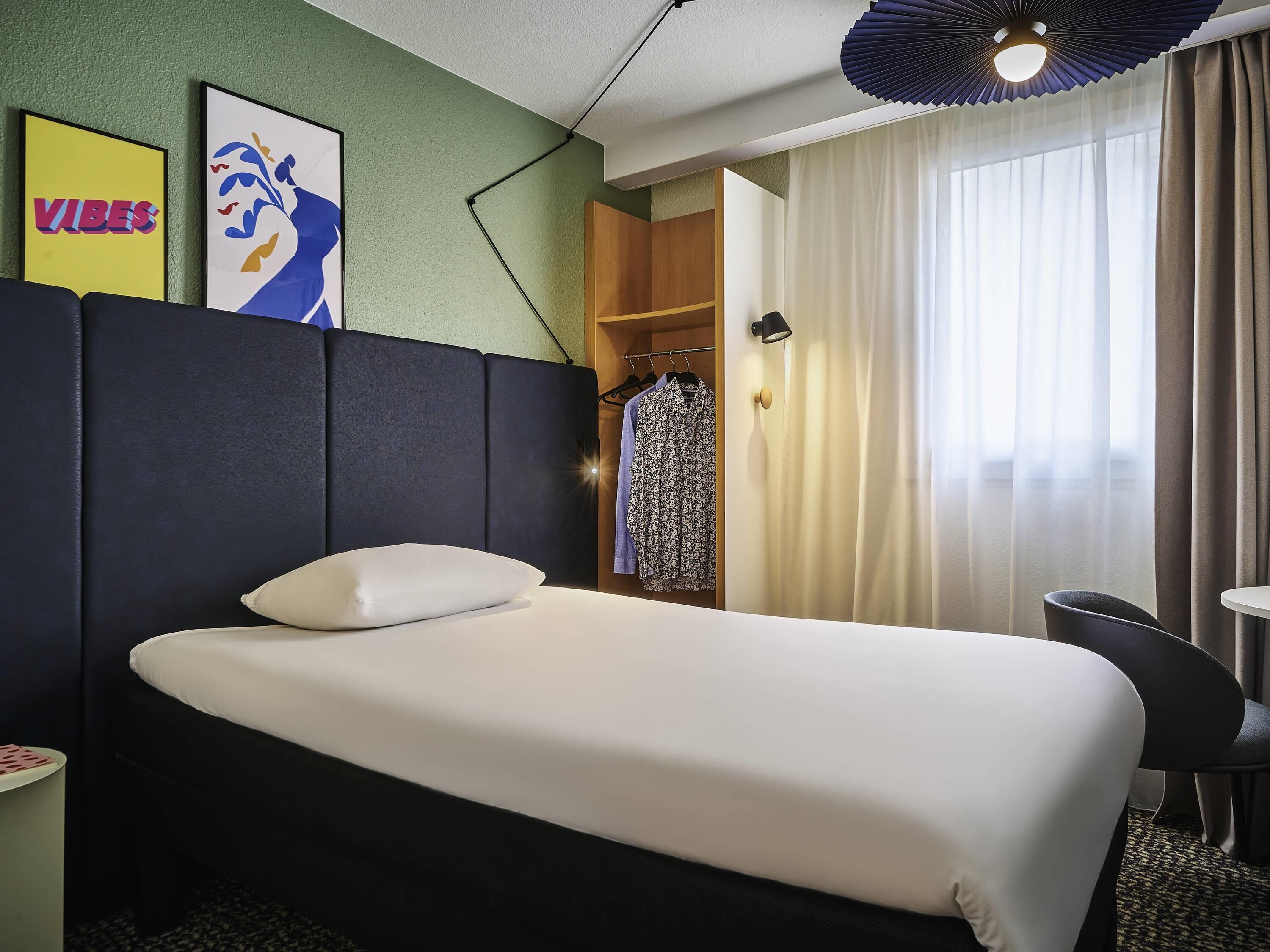 Habitación estándar, 1 cama individual | Escritorio, tabla de planchar con plancha y cunas gratuitas 