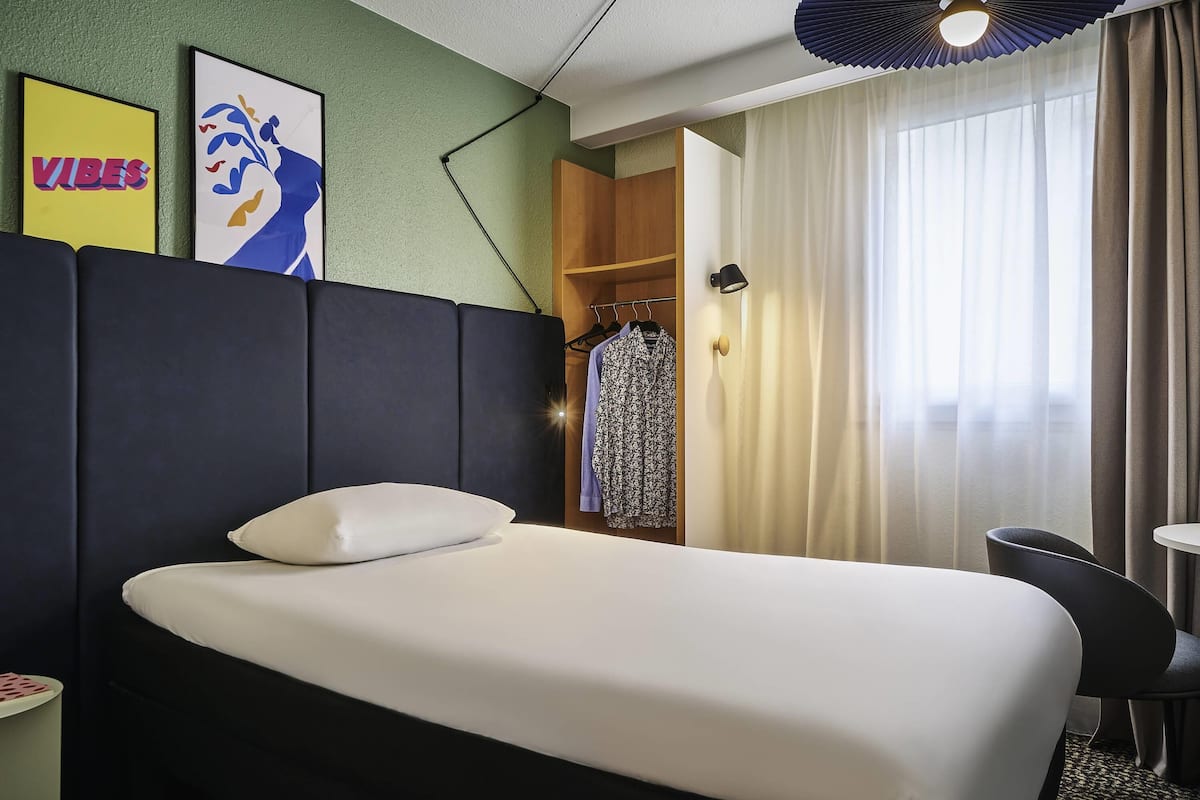 Habitación estándar, 1 cama individual | Escritorio, tabla de planchar con plancha y cunas gratuitas 