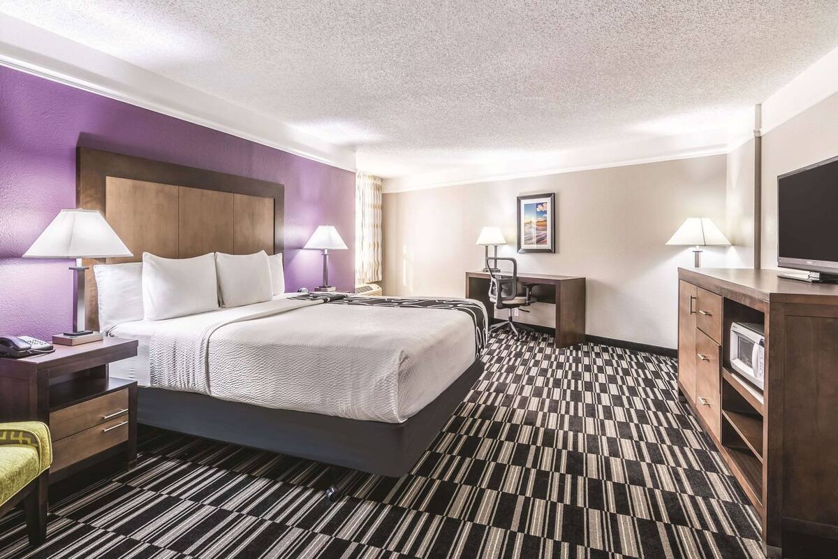 Premium bedding, pillow-top beds, blackout curtains, iron/ironing board