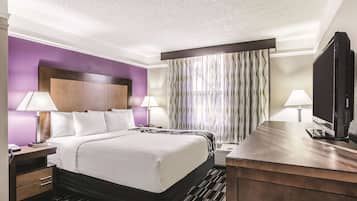 Premium bedding, pillow-top beds, blackout curtains, iron/ironing board
