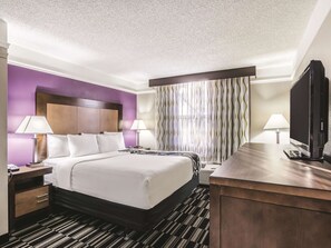 Deluxe Room, 1 King Bed, Non Smoking | Premium bedding, pillow-top beds, blackout curtains, iron/ironing board