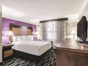 Deluxe Room, 1 King Bed, Non Smoking | Premium bedding, pillow-top beds, blackout curtains, iron/ironing board