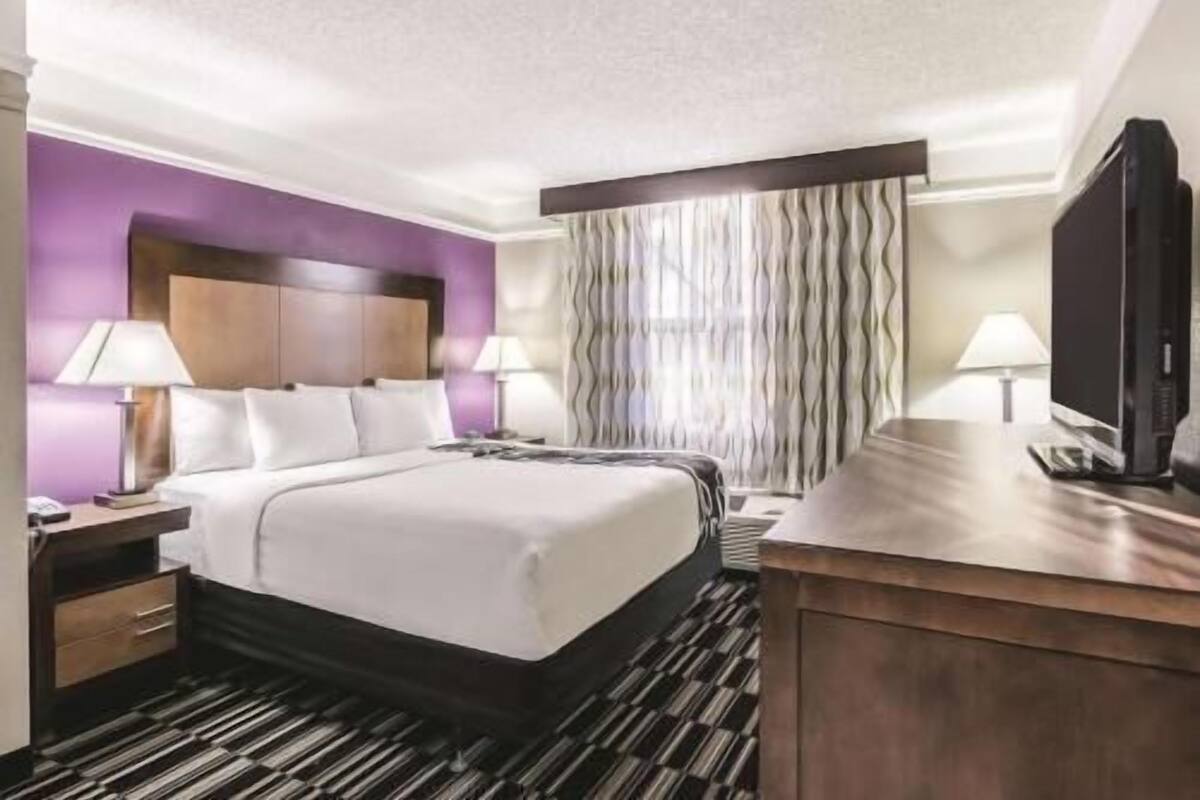 Premium bedding, pillow-top beds, blackout curtains, iron/ironing board