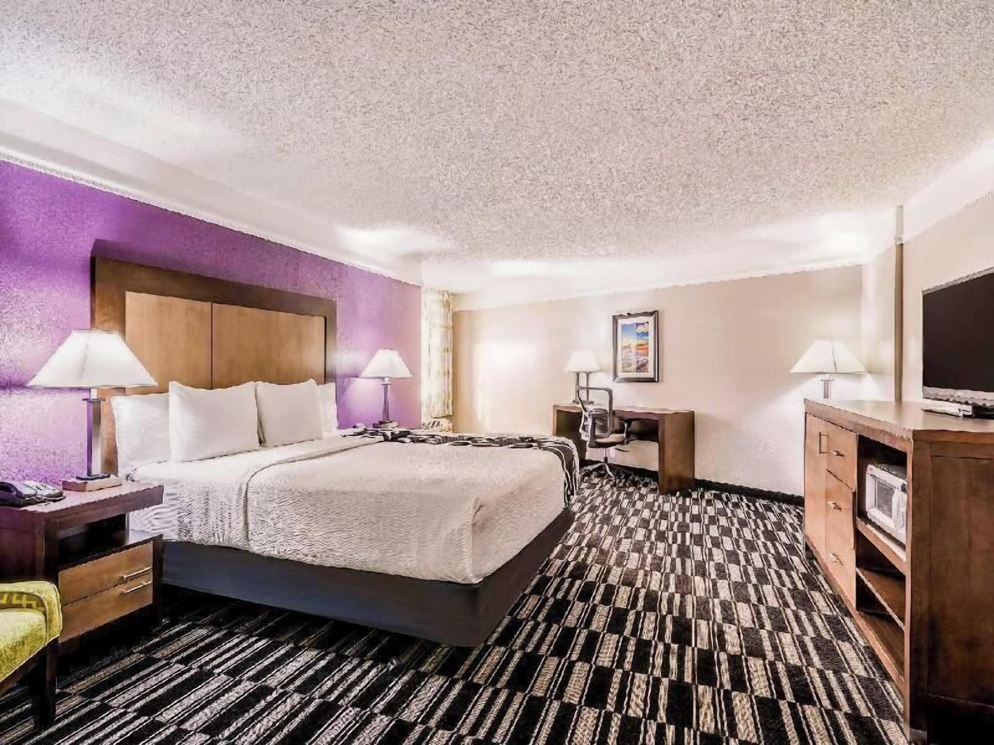 Premium bedding, pillow-top beds, blackout curtains, iron/ironing board