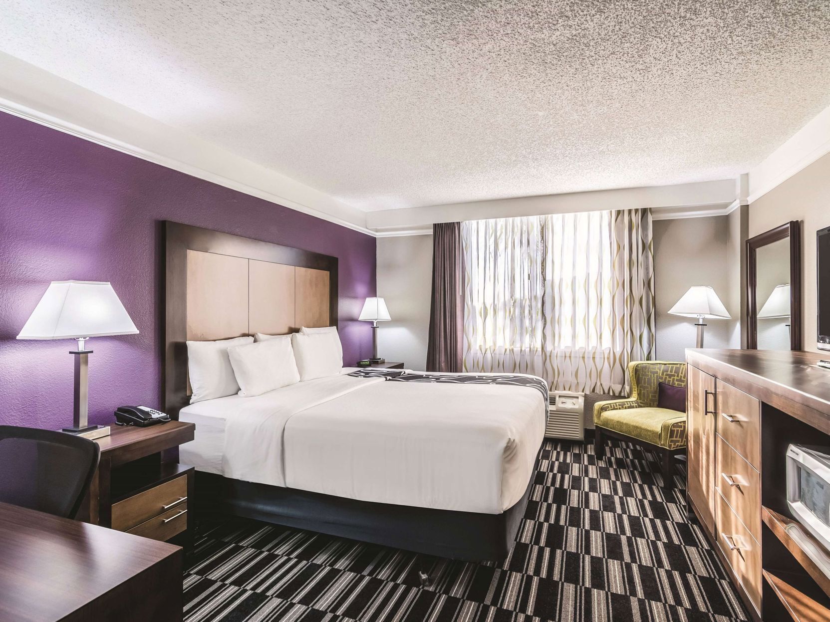 Premium bedding, pillow-top beds, blackout curtains, iron/ironing board