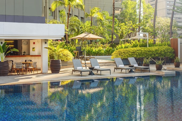 Outdoor pool, open 6:00 AM to 10:00 PM, pool umbrellas, pool loungers