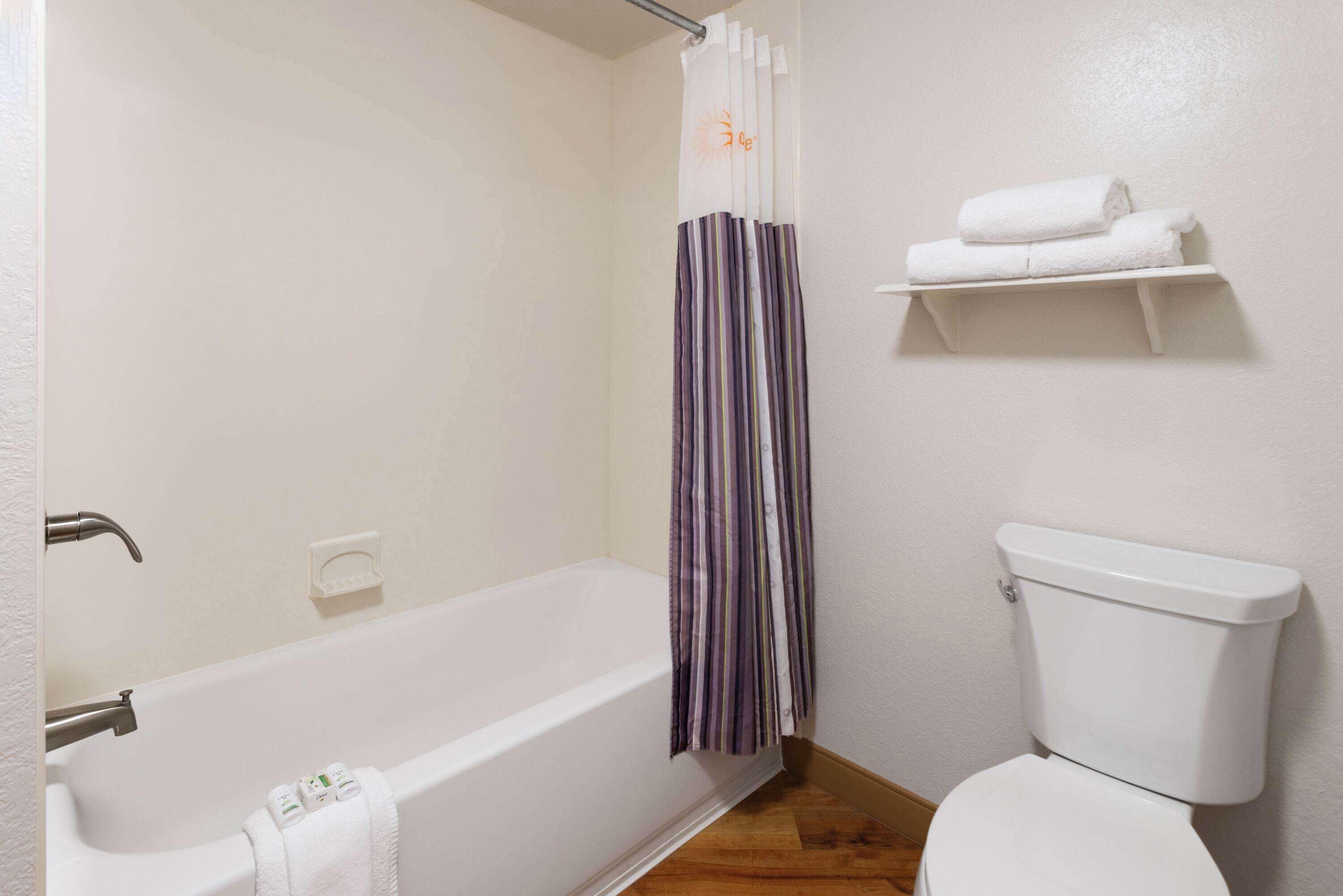combined shower/bathtub, eco-friendly toiletries, hair dryer, towels