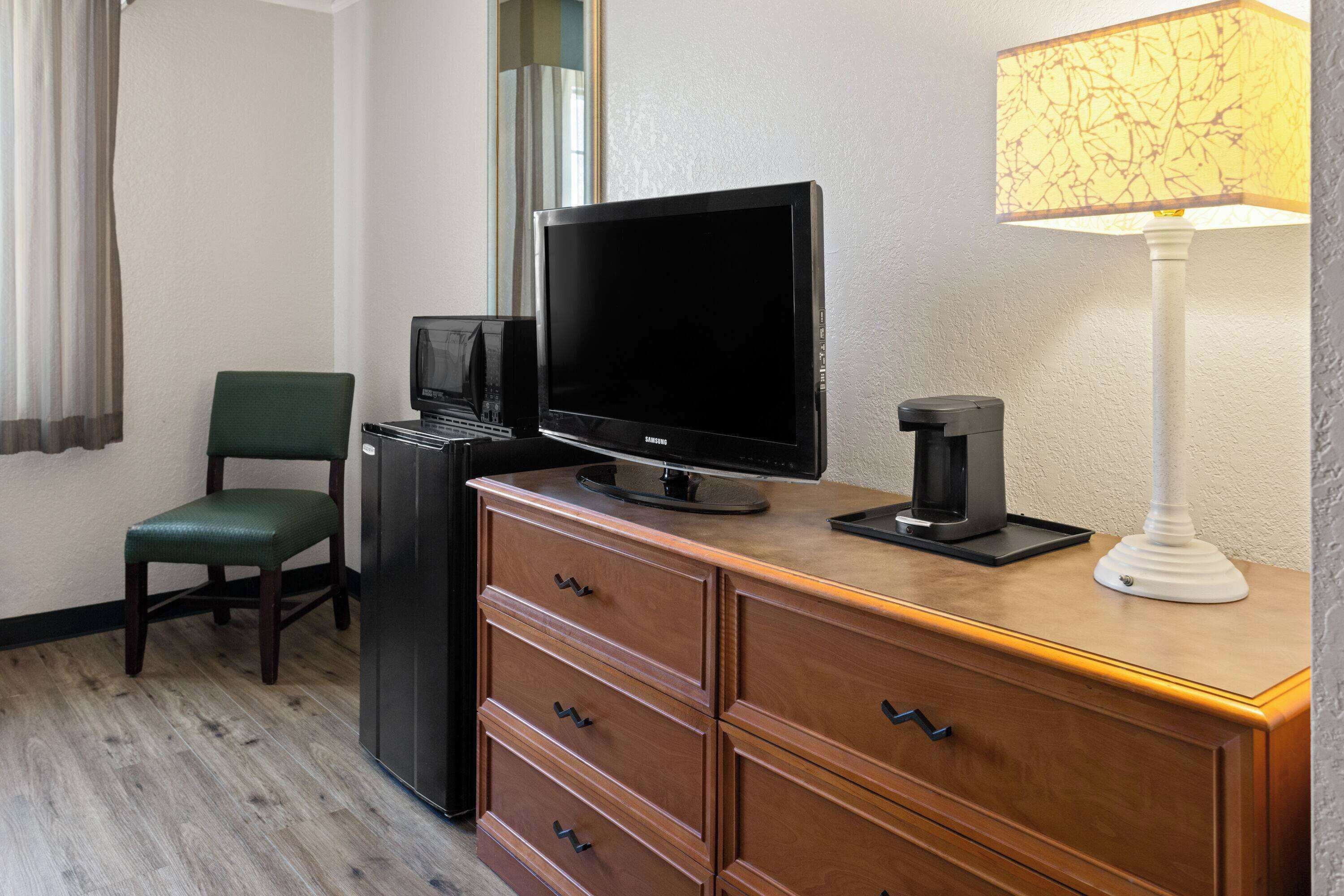 premium bedding, pillow-top beds, desk, blackout curtains