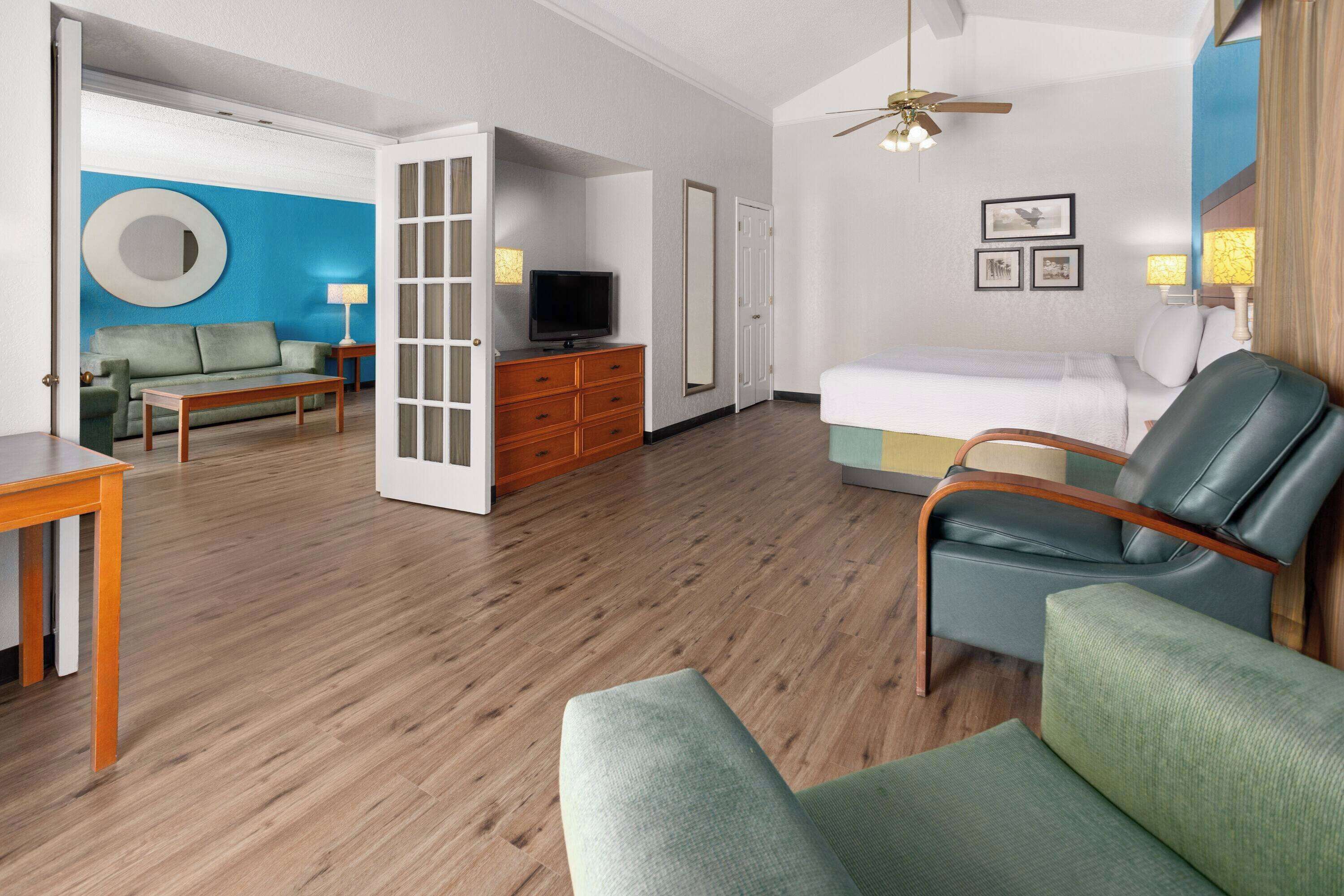 premium bedding, pillow-top beds, desk, blackout curtains