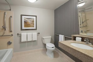 Combined shower/bathtub, free toiletries, hair dryer, towels
