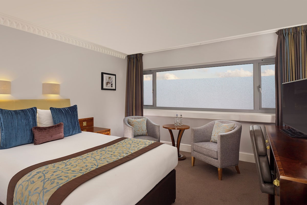 Standard Double Limited View | Premium bedding, in-room safe, laptop workspace, iron/ironing board