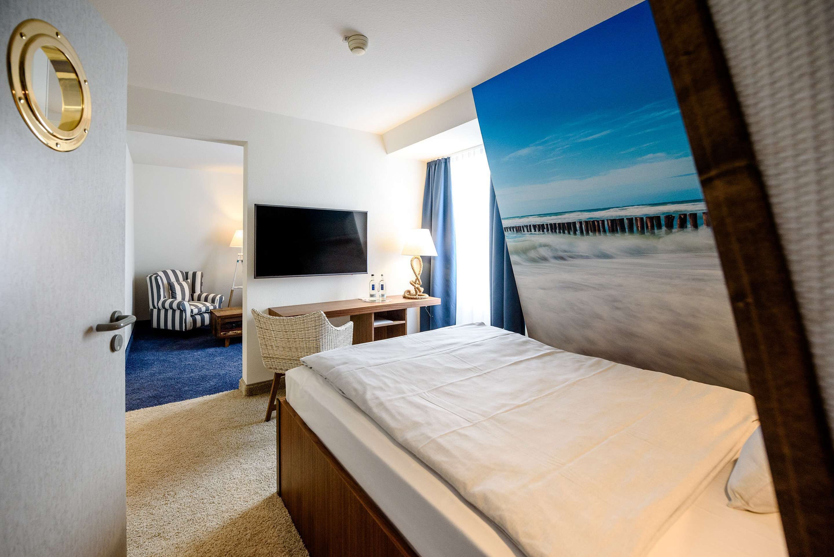 junior suite | 1 bedroom, in-room safe, desk, blackout curtains