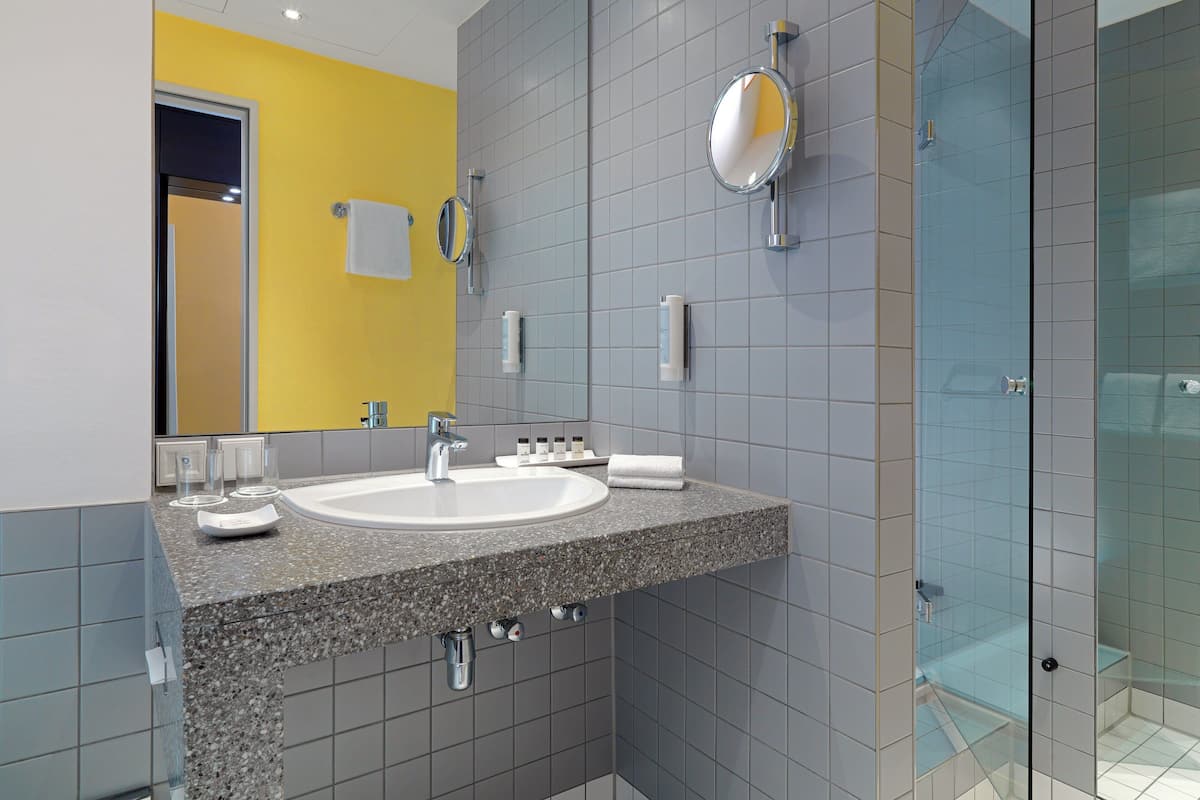 shower, free toiletries, hair dryer, bathrobes