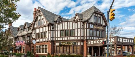 A Tudor-style building with a sign for 'Marriott Inn' and 'Southfork's at the National Exemplar'.