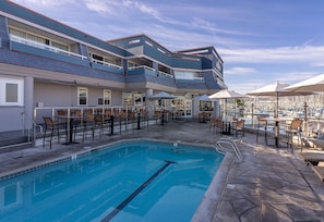 Outdoor pool, open 7:00 AM to 10:00 PM, pool umbrellas, pool loungers