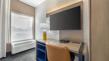 Desk, laptop workspace, iron/ironing board, free cribs/infant beds