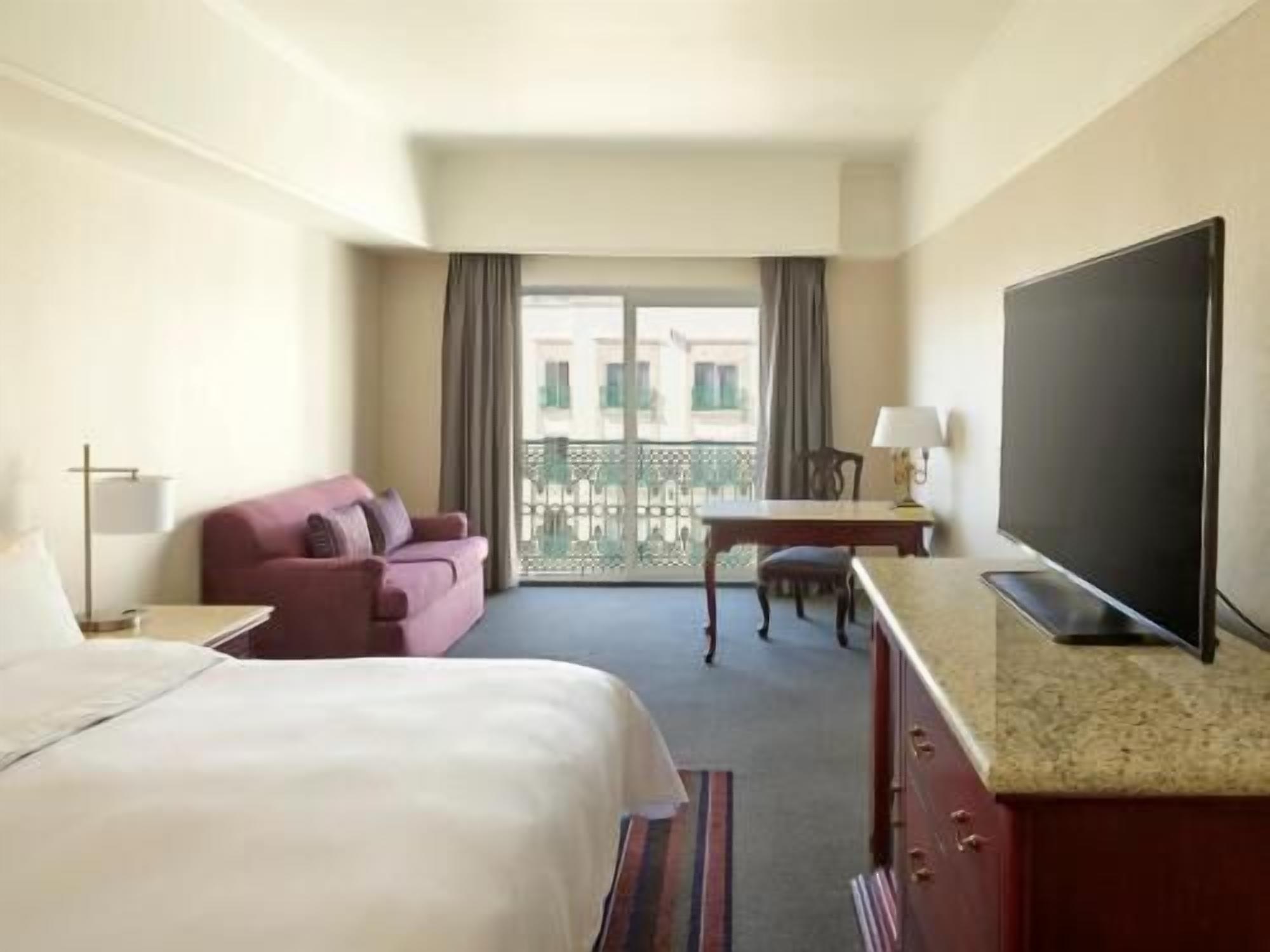 Premium bedding, down duvets, pillow-top beds, in-room safe