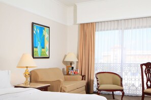 Premium bedding, down comforters, pillowtop beds, in-room safe