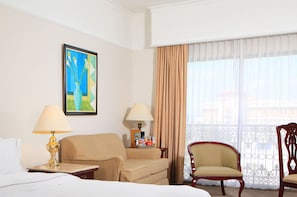 Premium bedding, down comforters, pillowtop beds, in-room safe