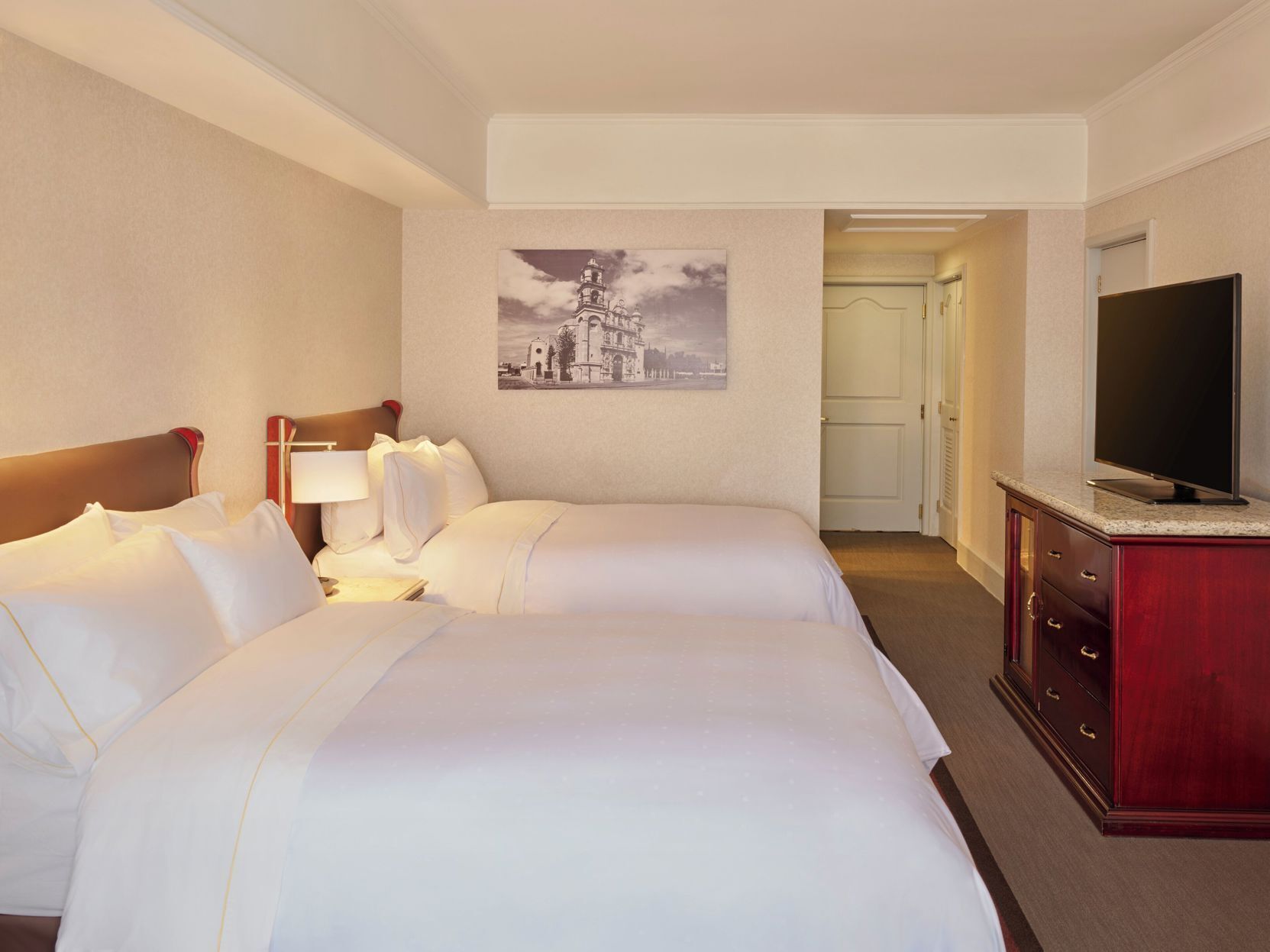 Premium bedding, down duvets, pillow-top beds, in-room safe